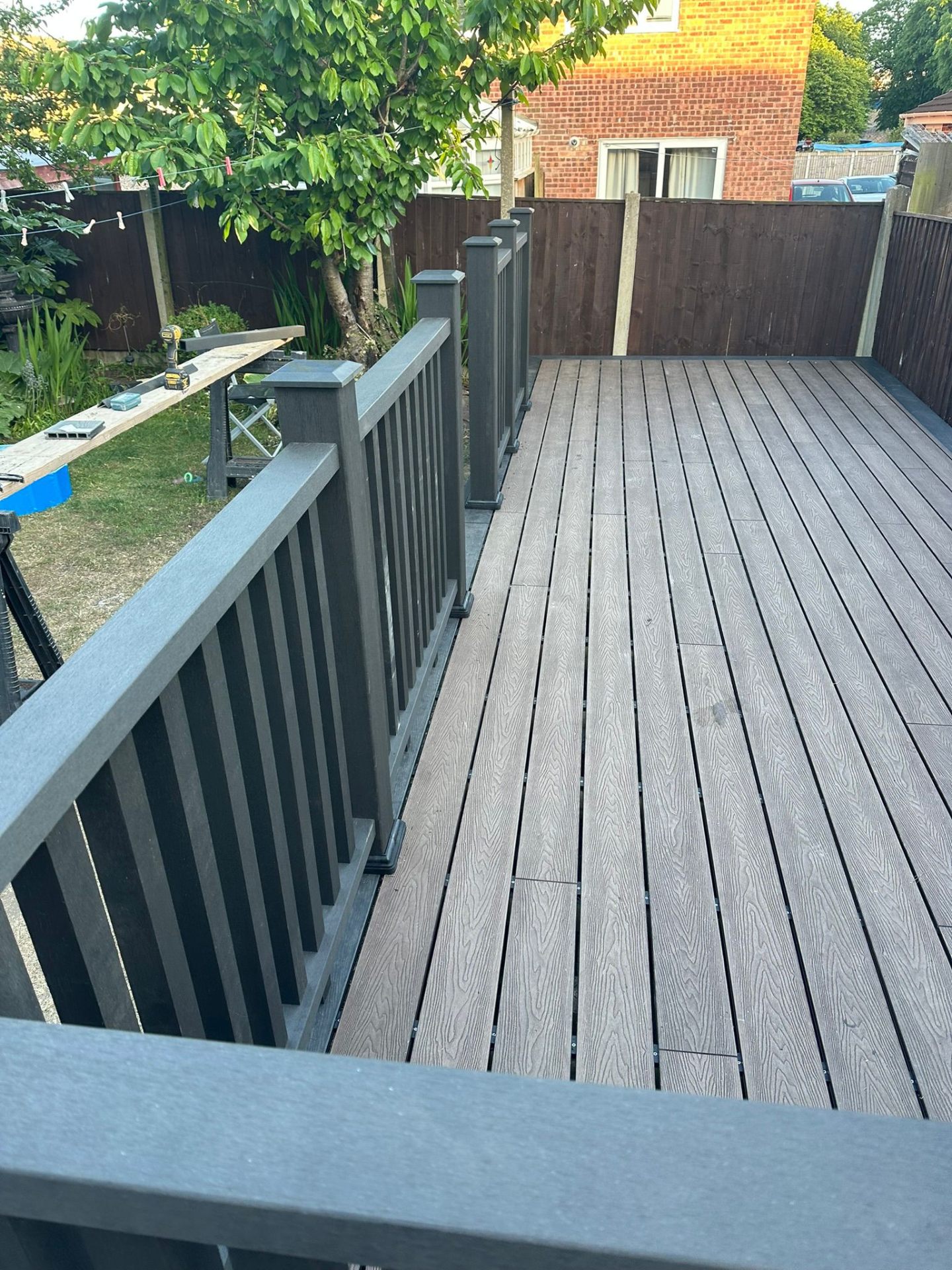 Close-up of composite decking with grey balustrade by Sherwood