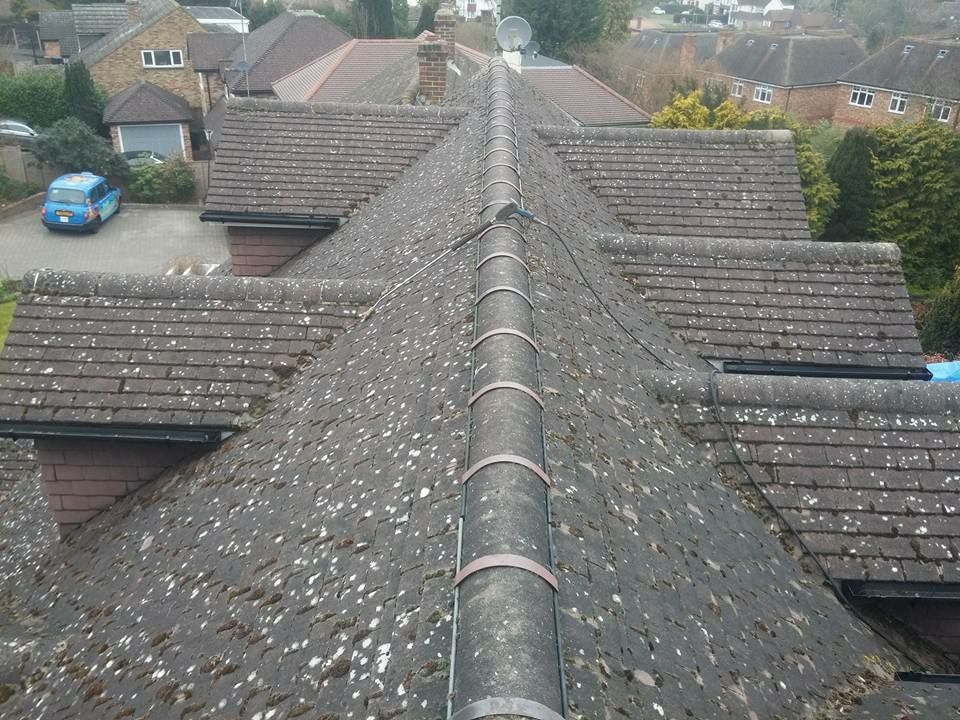Completed clay tile roof replacement on a residential property