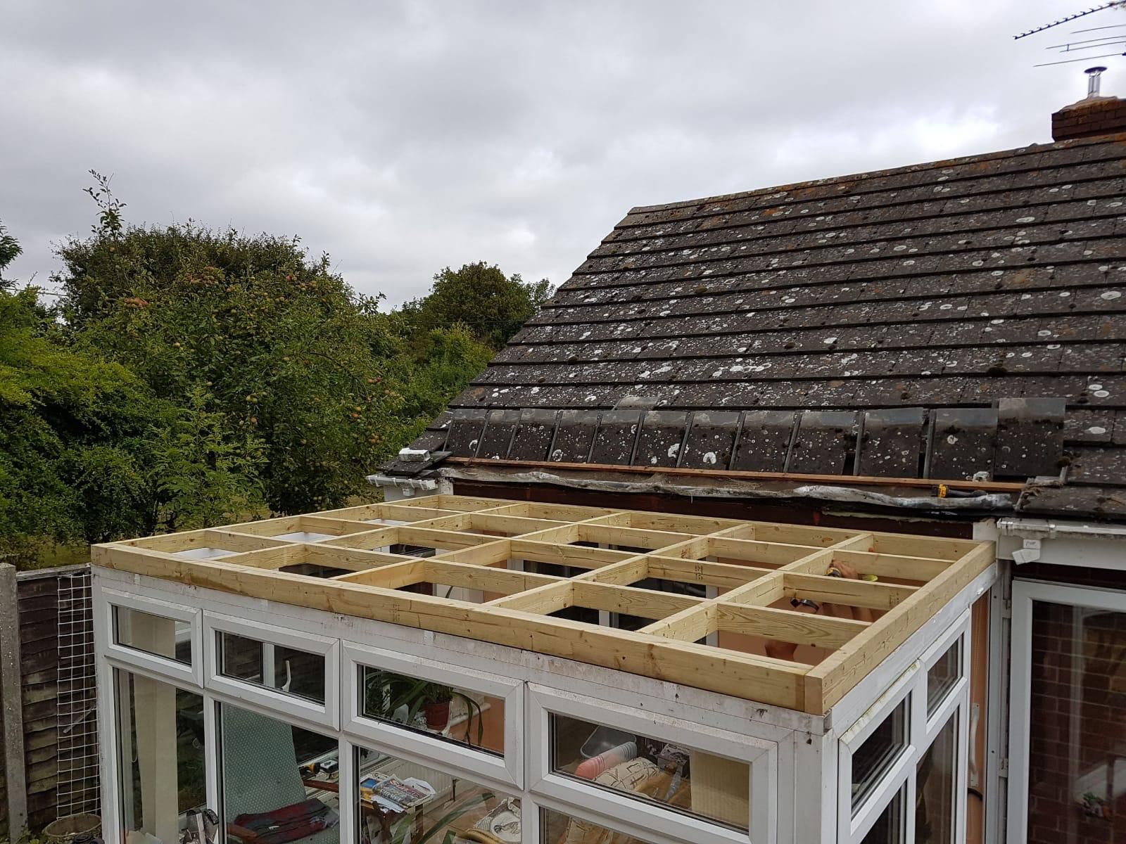 Conservatory roof replacement with new timber rafters and underlay