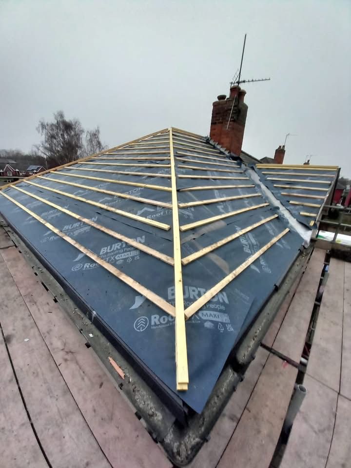 New timber rafters and breather membrane installed during a roof replacement